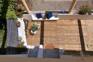 an overhead view of a patio with a bench at Rosanna Maison in Ischia