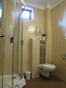 Kúpeľňa v ubytovaní Grand Hotel Senica, Garni