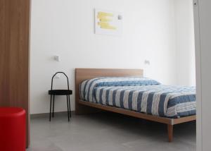 Posteľ alebo postele v izbe v ubytovaní Dainese Apartments, Casa Miriam