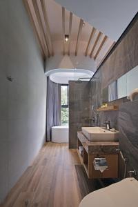 a bathroom with a sink and a bath tub at Doris Home in Yuchi +47 photos