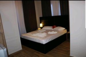 Katil atau katil-katil dalam bilik di Hotel Golden