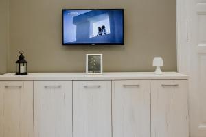 TV a/nebo společenská místnost v ubytování Apartmani Galea