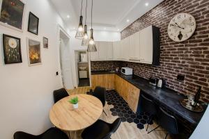 Kuchyň nebo kuchyňský kout v ubytování Apartmani Galea