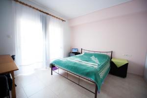 Postel nebo postele na pokoji v ubytování Elias Appartment