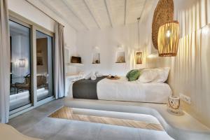 Кровать или кровати в номере Aelion Villa