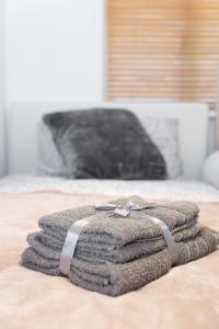 Кровать или кровати в номере Luxury Central Newcastle Apartment 20
