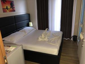 Katil atau katil-katil dalam bilik di Hotel Golden