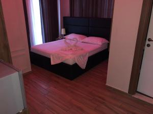 Katil atau katil-katil dalam bilik di Hotel Golden