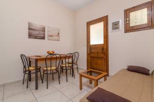 A seating area at Andreas Apartments Még 37 kép
