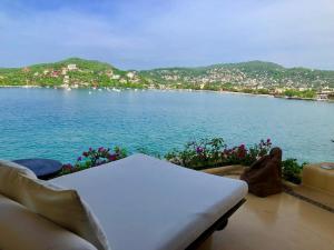 a view of a large body of water at Espuma Hotel - Adults Only in Zihuatanejo