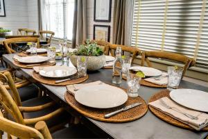 a long table with plates and napkins on it at Eleven Scarp Ridge Lodge in Crested Butte