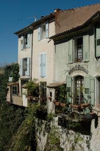 an old house on the side of a hill at Maison Provençale in Flayosc