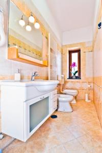 a bathroom with a sink and a toilet at Donna Rachele in Agerola