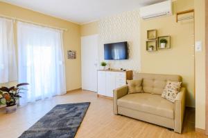 Televízia a/alebo spoločenská miestnosť v ubytovaní La Maison du Calme