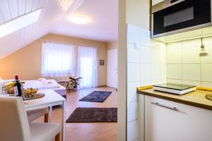 Kuchyňa alebo kuchynka v ubytovaní La Maison du Calme