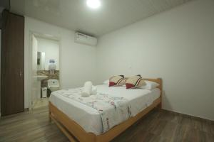 Postel nebo postele na pokoji v ubytování Hotel Nauticus