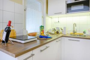 Kuchyňa alebo kuchynka v ubytovaní La Maison du Calme