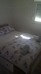 Een bed of bedden in een kamer bij Jelica