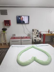 TV a/nebo společenská místnost v ubytování Just nature