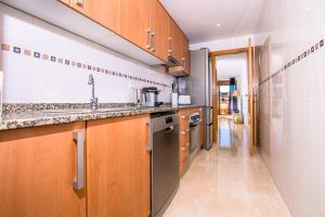 Cuisine ou kitchenette dans l'établissement Apartamento Benvinguts Playa Arenal