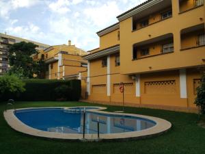 Bazén v ubytovaní Precioso Apartamento Frente Al Mar alebo v jeho blízkosti