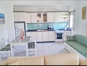 A kitchen or kitchenette at Stavrini's House