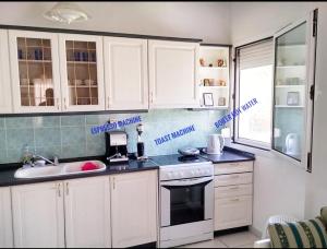 A kitchen or kitchenette at Stavrini's House
