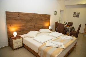 Un pat sau paturi într-o cameră la Villa Andjelina