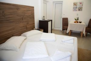 Cama ou camas em um quarto em Villa Andjelina