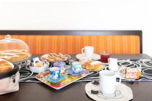 Možnosti snídaně pro hosty v ubytování Toma la Luna