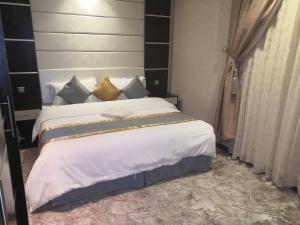 Llit o llits en una habitació de Hotel Zayara