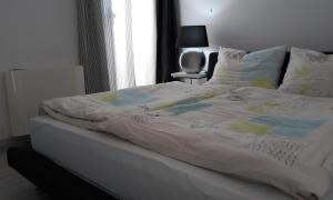 Postel nebo postele na pokoji v ubytování St.Barth Apartments