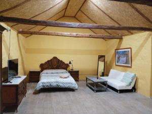 Postel nebo postele na pokoji v ubytování Casa rural la cruz