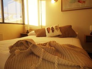 Voodi või voodid majutusasutuse El Colorado Ski Departamentos toas +19 fotot