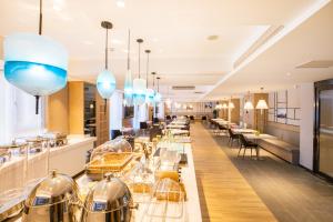 Posezení v ubytování Atour Hotel Qingdao Airport Chengyang Wanxianghui