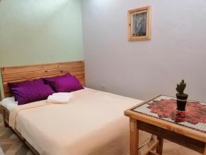 Una cama o camas en una habitación de Sagada Lodging Home