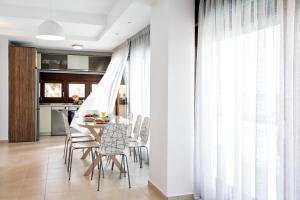 Posezení v ubytování Magdani Private Residences