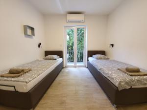 Postel nebo postele na pokoji v ubytování Jagger House