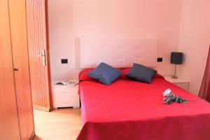 A bed or beds in a room at Villa Ginny
