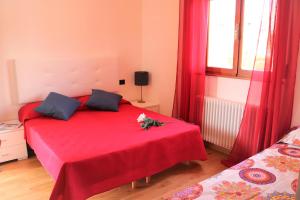 A bed or beds in a room at Villa Ginny