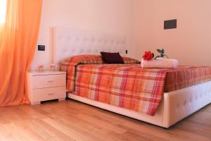 A bed or beds in a room at Villa Ginny