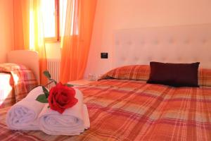 A bed or beds in a room at Villa Ginny
