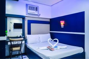 TV a/nebo společenská místnost v ubytování Hotel 99 Cubao