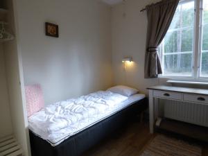 Letto o letti in una camera di Nya Skogsgården Hostel