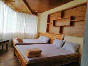 Una cama o camas en una habitación de Sagada Lodging Home