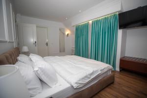 Voodi või voodid majutusasutuse Hotel Vila Zeus toas