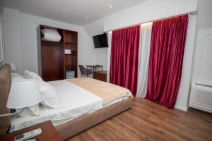 Voodi või voodid majutusasutuse Hotel Vila Zeus toas