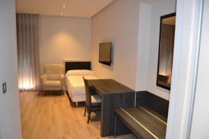 Postel nebo postele na pokoji v ubytování Hotel Villegas