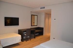 Postel nebo postele na pokoji v ubytování Hotel Villegas + 37 fotografií