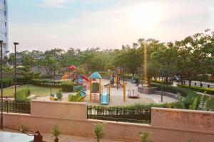 a playground in a park with at Crest Executive Suites, Whitefield in Bangalore